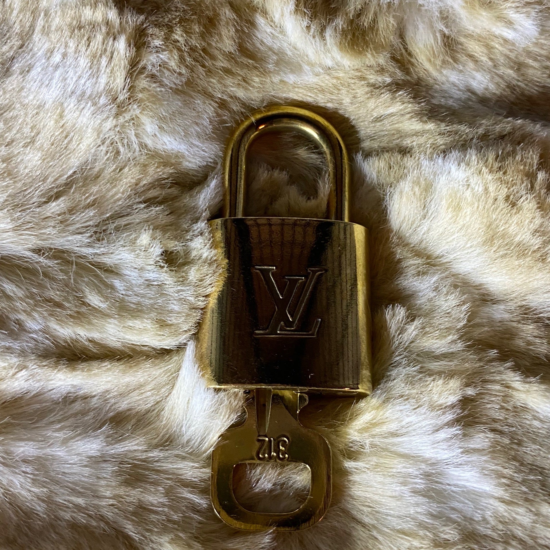 Selling Authentic Louis Vuitton Lock and Key #312